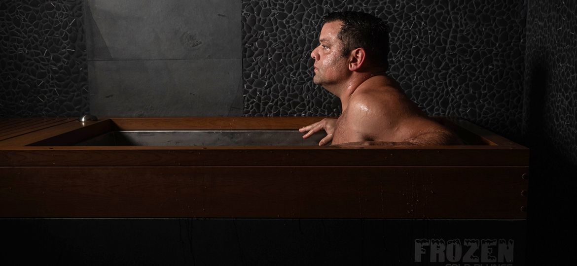man utilizing the cold plunge at SoulSpace in Cleveland for health benefits
