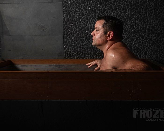 man utilizing the cold plunge at SoulSpace in Cleveland for health benefits