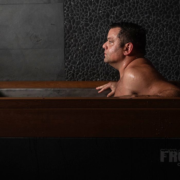 man utilizing the cold plunge at SoulSpace in Cleveland for health benefits