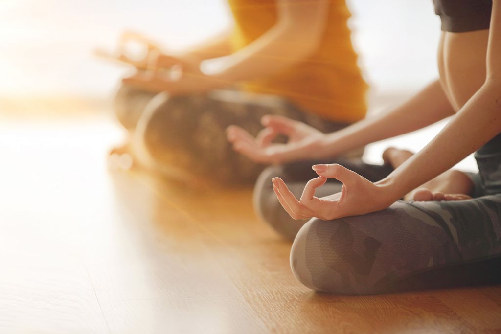 women practicing yoga in Cleveland as a part of communal healing