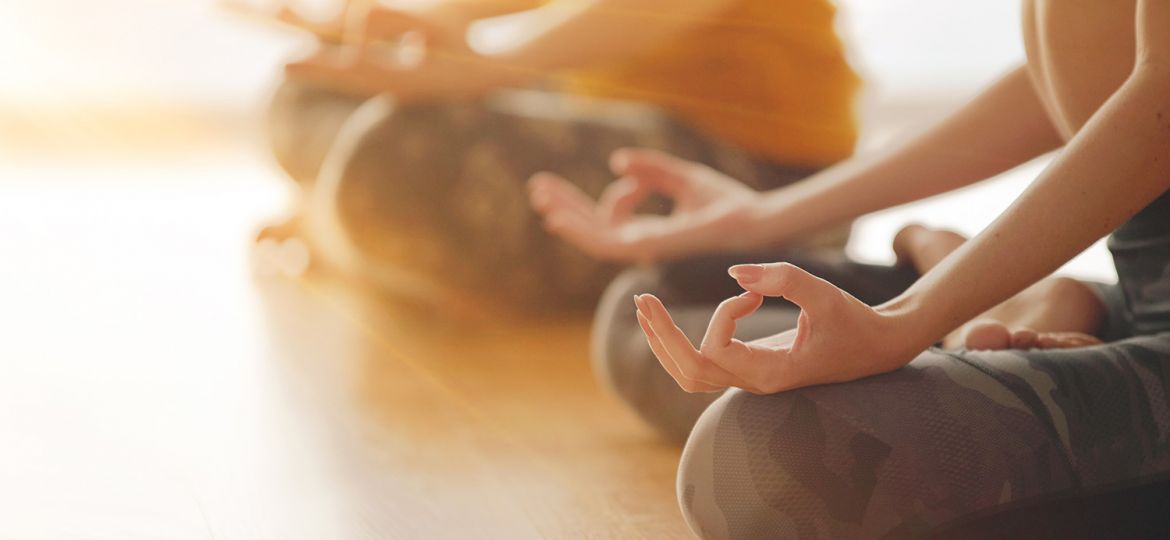 women practicing yoga in Cleveland as a part of communal healing