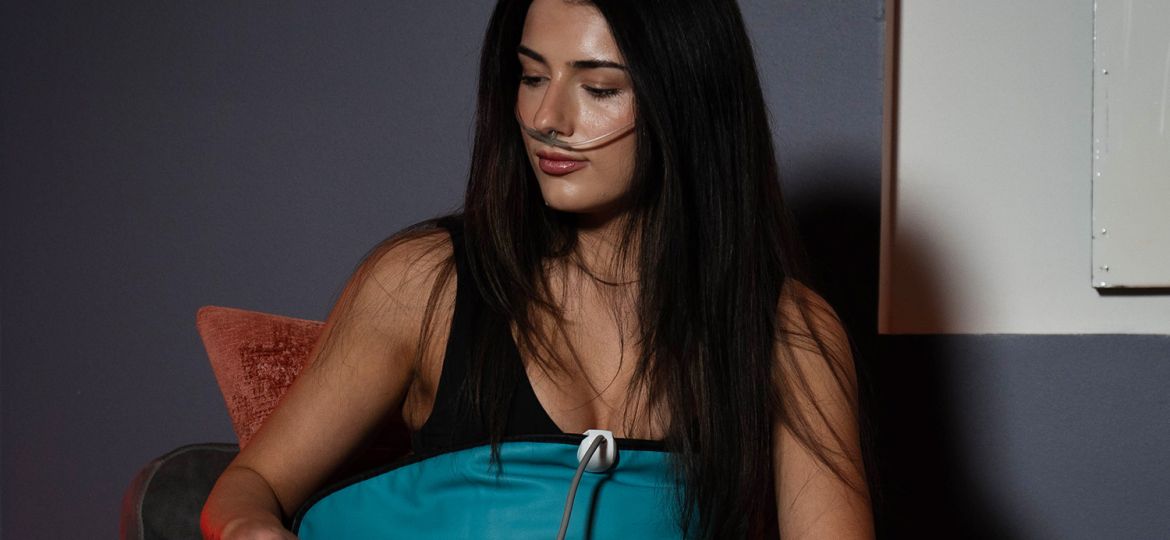 woman experiencing hydrogen therapy at calming space in Cleveland