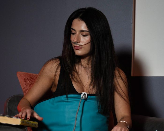 woman experiencing hydrogen therapy at calming space in Cleveland