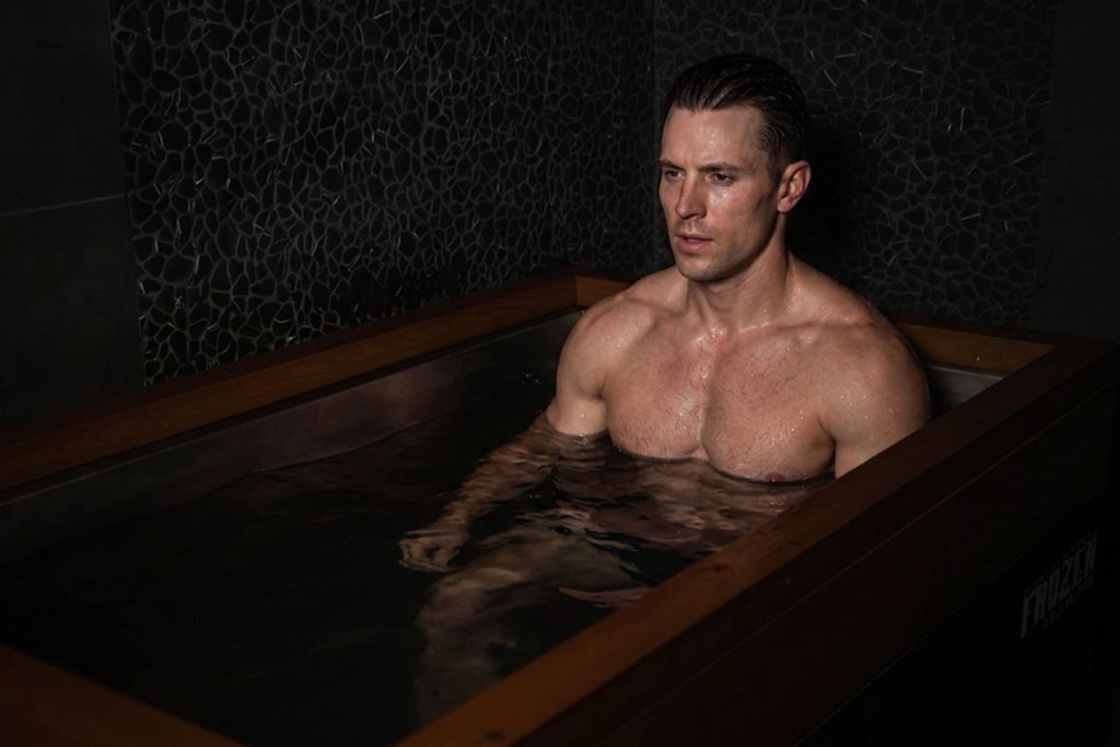 male athlete recovering in cold plunge session