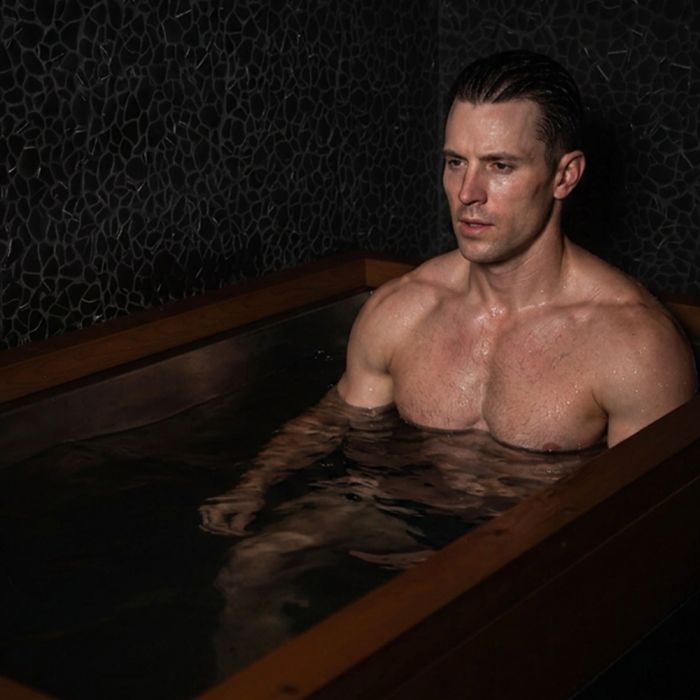 male athlete recovering in cold plunge session