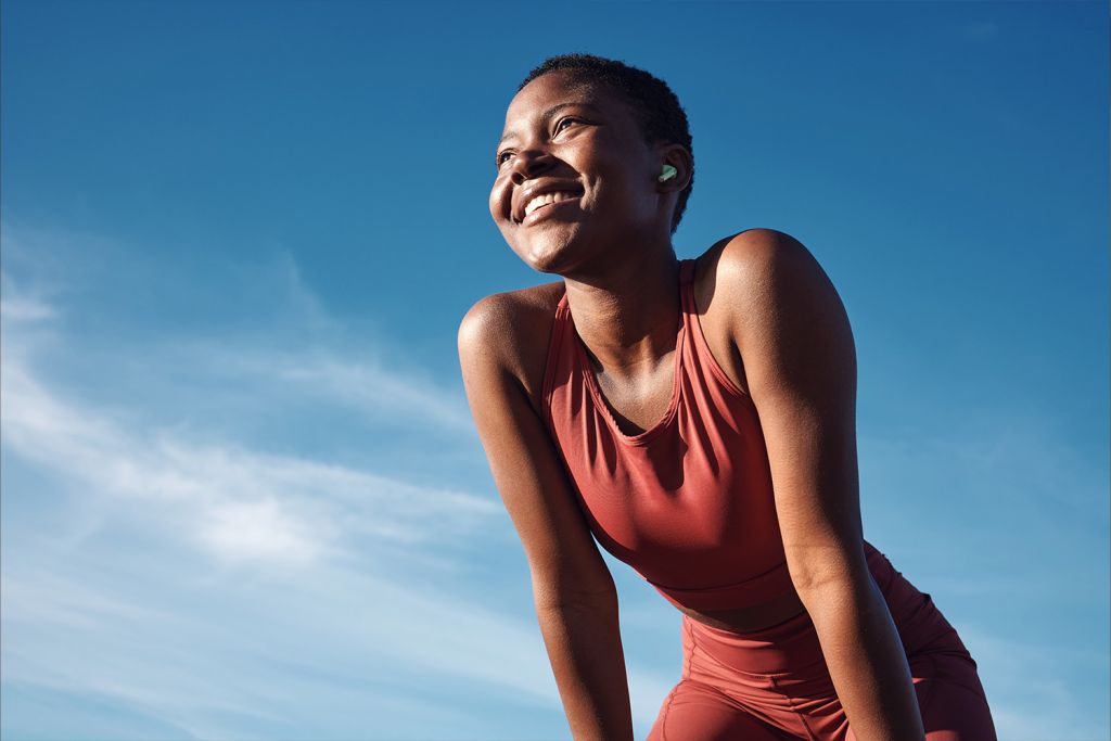 female runner post workout considering cold plunge