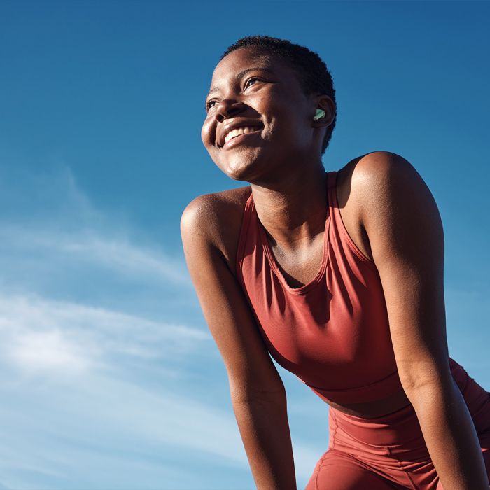 female runner post workout considering cold plunge